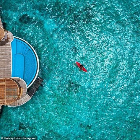 Lindsay Lohan wears plunging red swimsuit in Maldives 